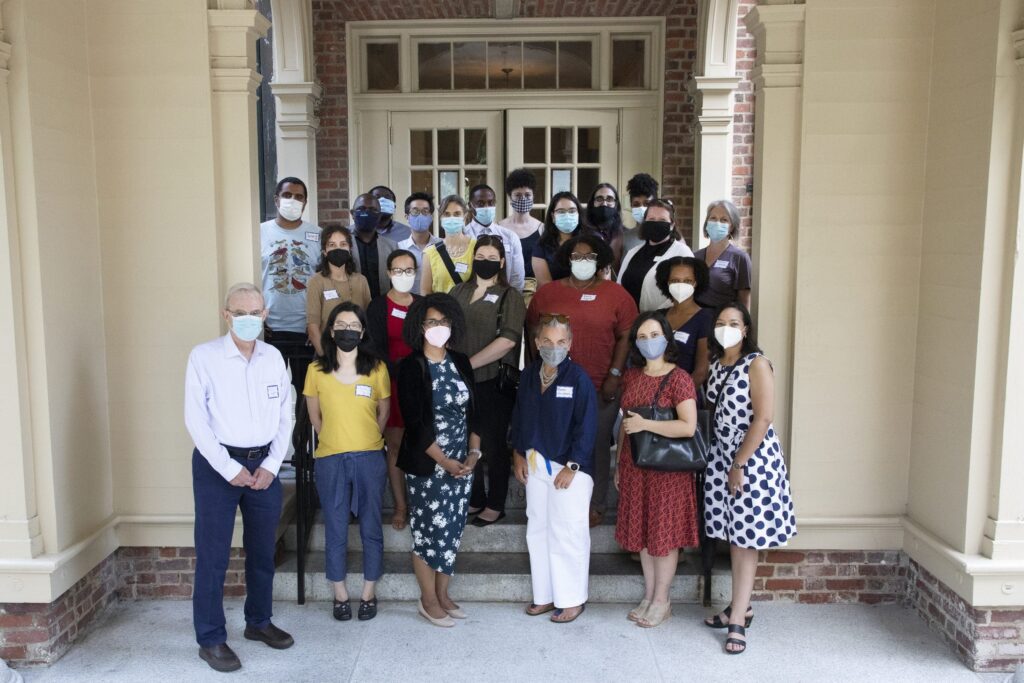Magnuson and Tan with past and current fellows