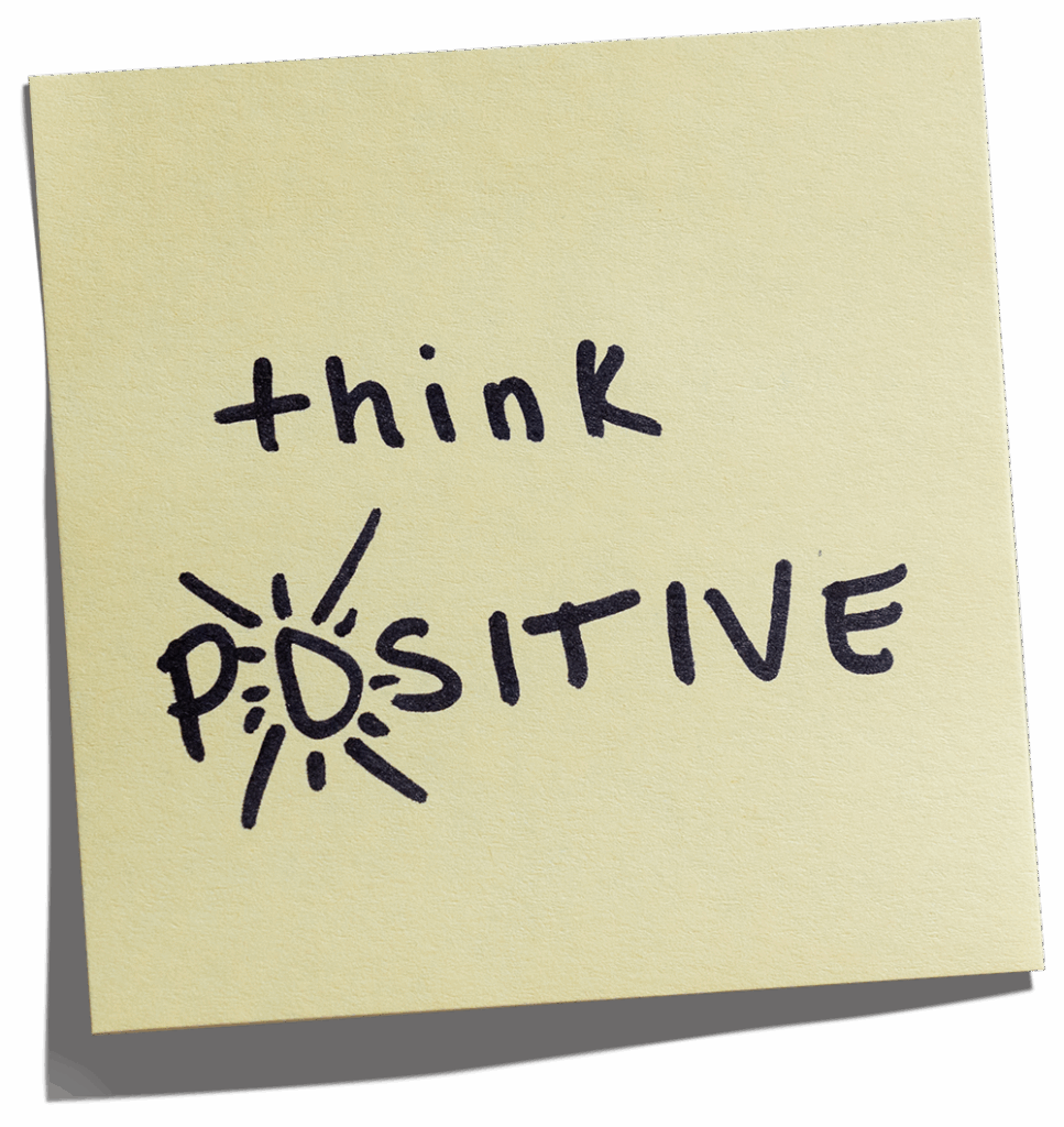 post-it that reads "think positive"