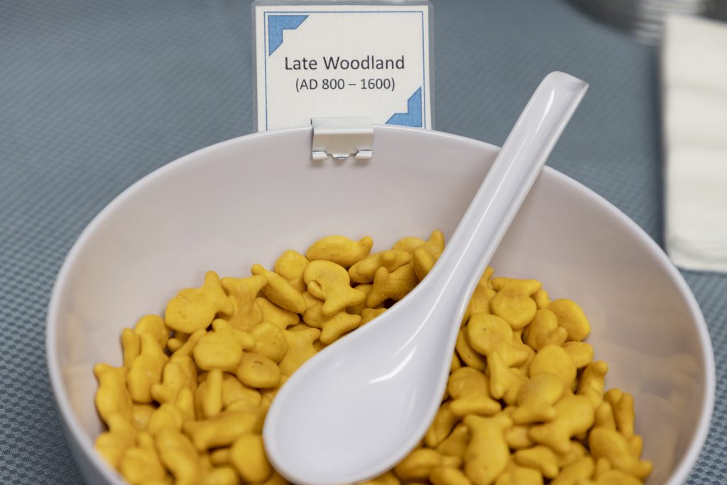 A bowl of goldfish crackers are labeled "Late Woodland (AD 800 - 1600)."