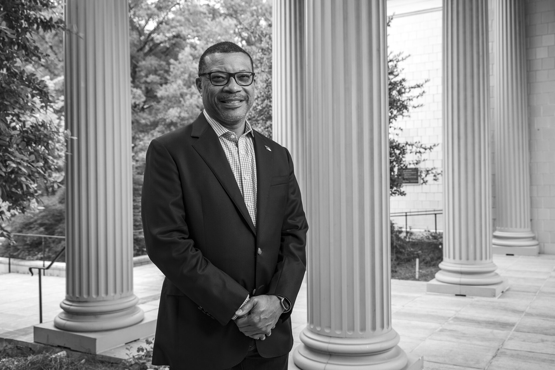 Jonathan Morgan stands among columns