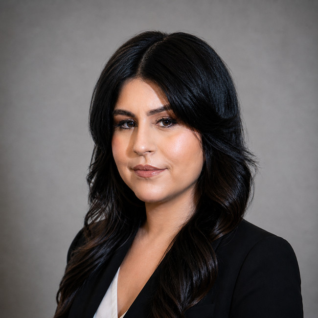 Headshot of Amina Castro-Corbett