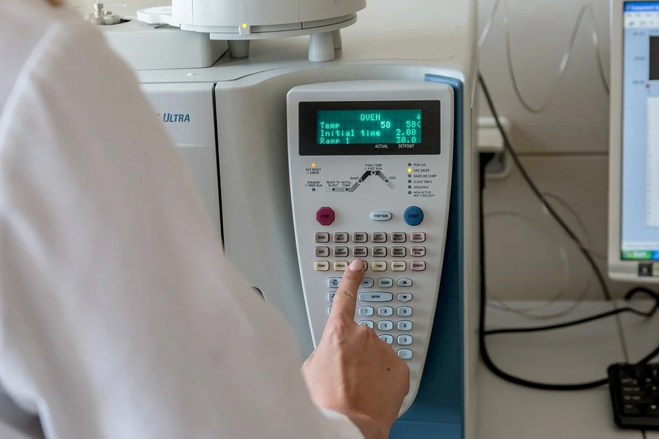 a person uses an autoclave in a hospital