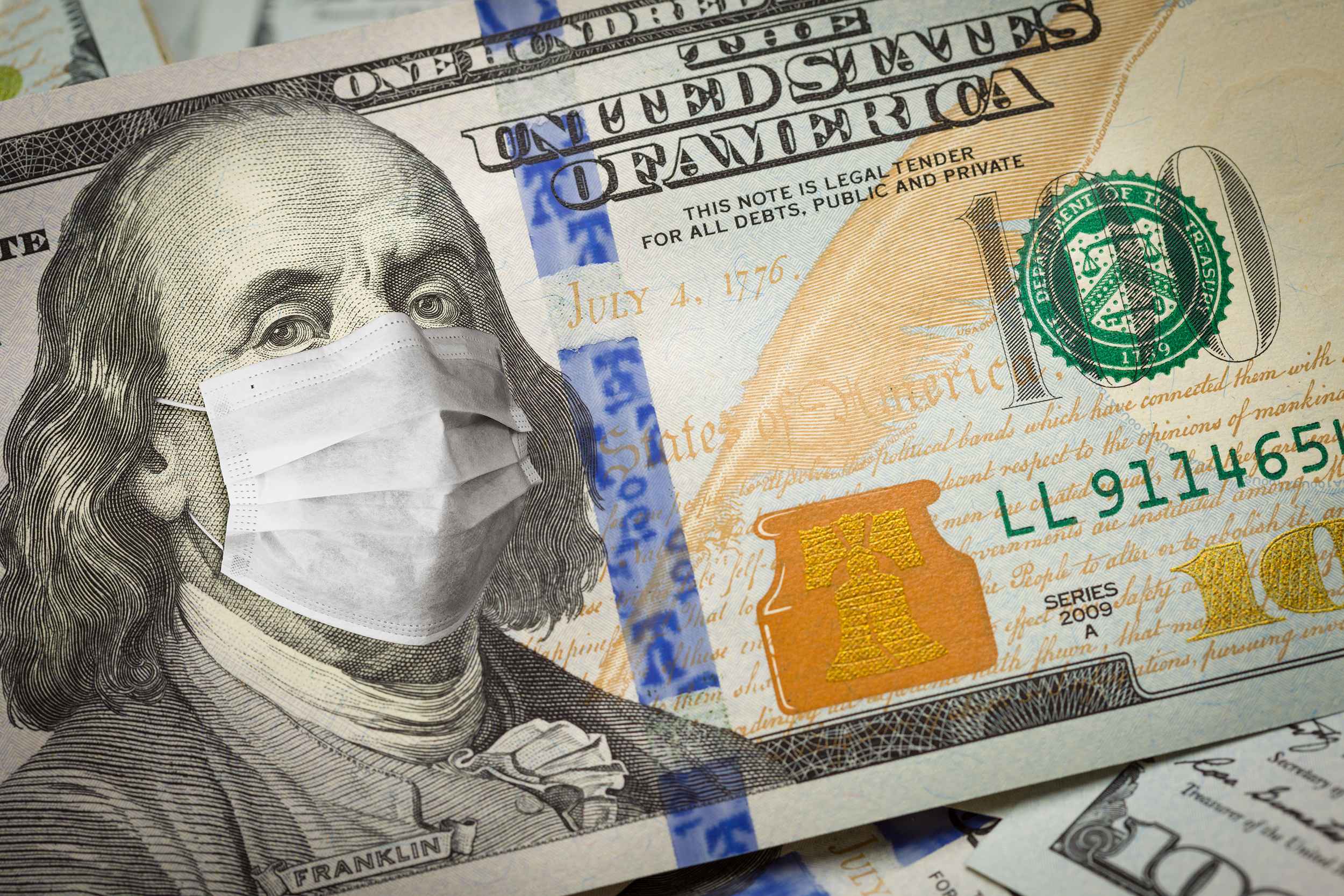One Hundred Dollar Bill With Medical Face Mask on George Washington.
