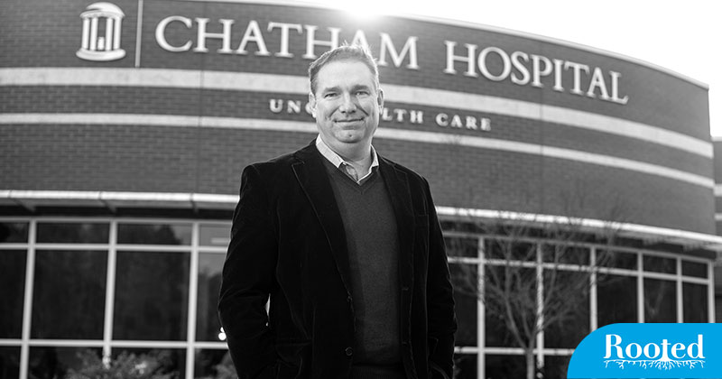 Mark Holmes stands in front of the Chatham Hospital.